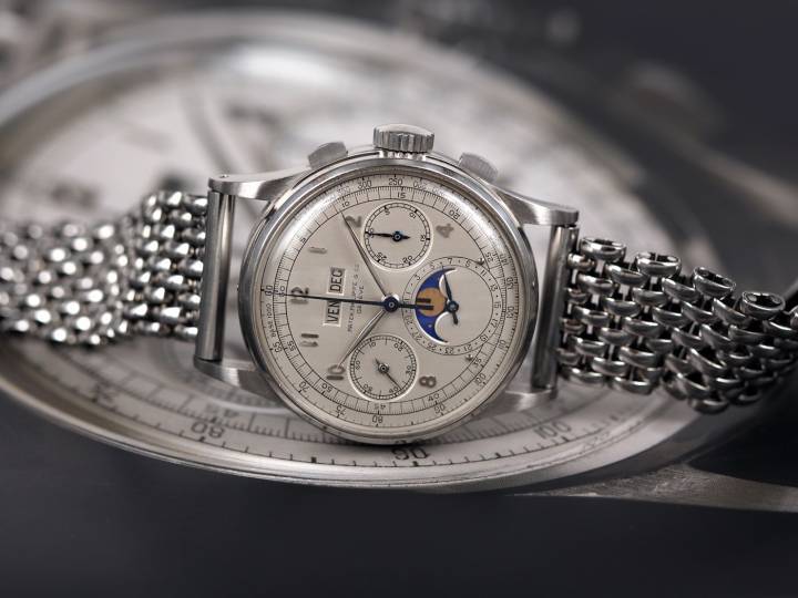 Sold for CHF 11,002,000. An extremely rare, highly attractive and historically important Patek Philippe stainless steel perpetual calendar chronograph wristwatch with moon phases, applied Arabic hour markers, tachymeter scale and bracelet. The watch is accompanied by an Extract from the Archives confirming the date of manufacture in 1943, and subsequent sale on February 22, 1944. Amongst the four known examples, the present watch, until now, was the only one that had yet to appear at auction. Of the four, three were made in the first series of the 1518's production, and one in the later series. The other three known examples remain closely held in private collections. Furthermore, this is the first time in over a decade that a stainless steel 1518 has been offered at auction. Since this watch's rediscovery in the 1990s, it has resided in the most exclusive private collections in the world.