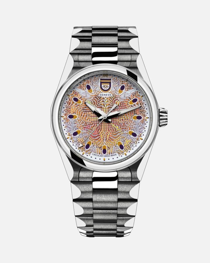  Le modèle Air de la nouvelle collection Elements d'ID Genève, inspirée de la beauté de la nature. Boîtier et bracelet en acier recyclé récupéré dans le Jura horloger, calibre ETA reconditionné et cadran en Morphotonix, nano-gravure n'utilisant pas d'encre aux teintures polluantes.