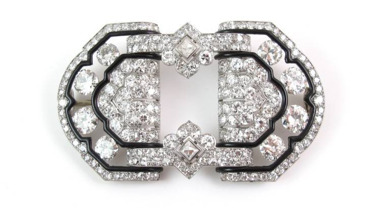 Faerber Collection - Broche Art Déco en diamants (estimés à un poids total de 16 carats) et émail noir, montée sur platine avec marque d'essai française et marque partielle du fabricant (Maynier et Pinon), vers 1930.