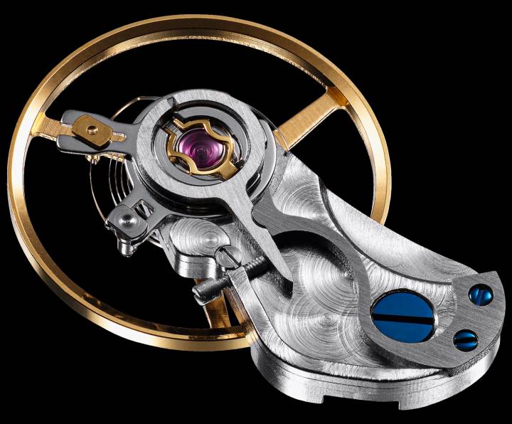 Module de l'organe réglant développé par la Manufacture Mühle-Glashütte. Surnommé pivert pour sa ressemblance avec le petit oiseau, il intègre un deuxième système d'absorption des chocs, en plus de l'Incabloc habituel des mouvements utilisés.