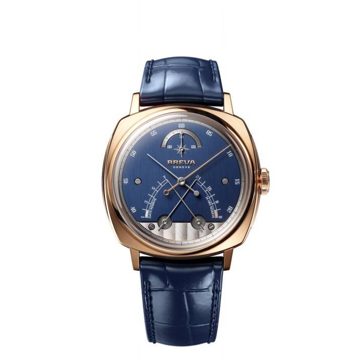 La Segreto di Lario, présentée ici en or rose avec cadran bleu, a signalé le retour de Breva sur la scène horlogère au printemps 2025. Les aiguilles croisées, signature stylistique et technique de la marque, assurent la double indication de la réserve de marche avec une double échelle de temps rétrograde. 